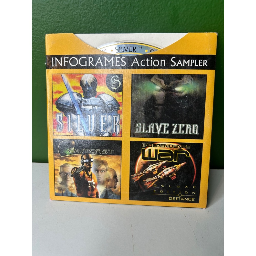 Infogrames Action Sampler PC CD-ROM 1999 Silver Slave Zero Outcast Demo Disc